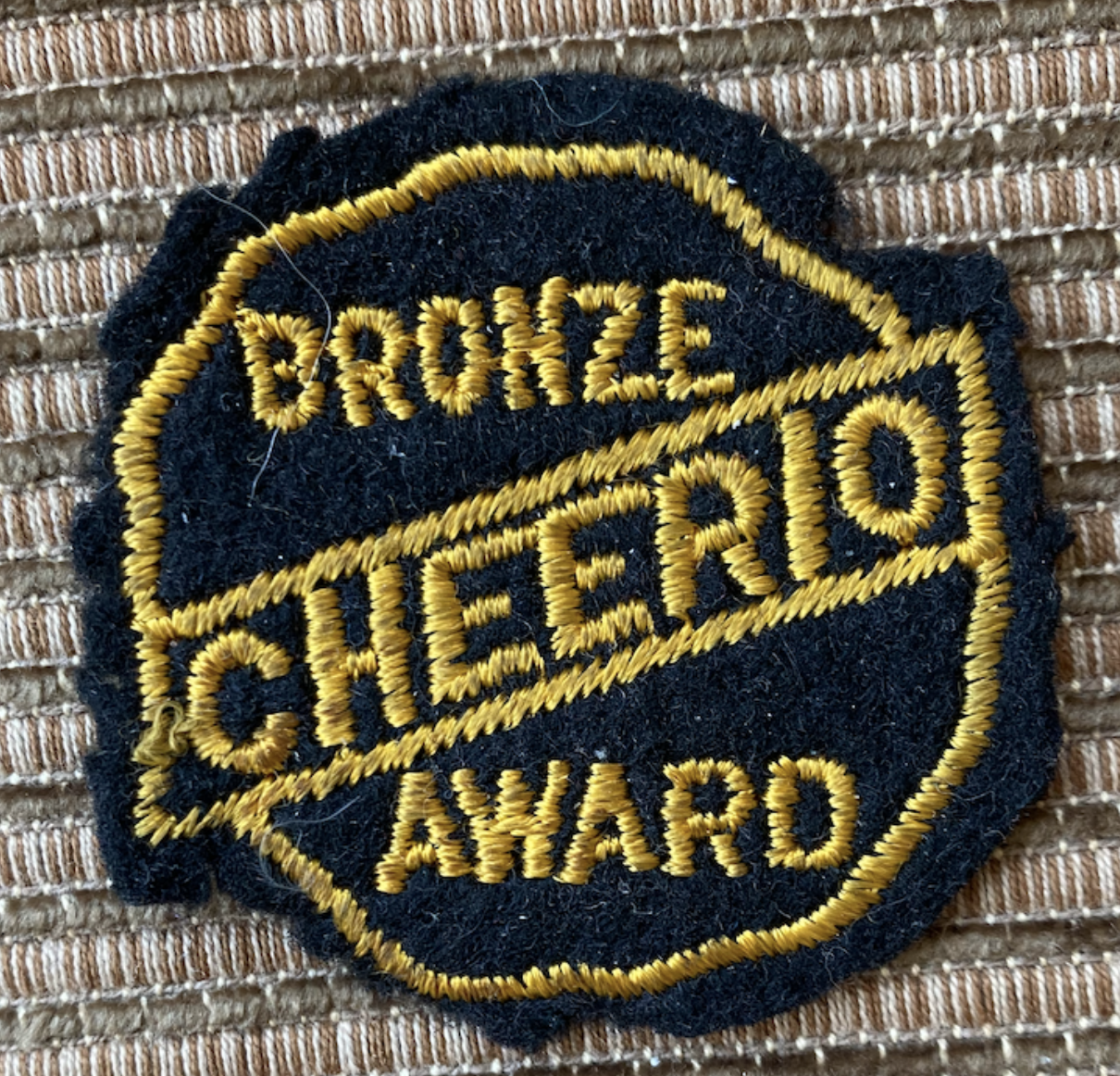 Cheerio Yo-yo Bronze Award Black Felt Patch